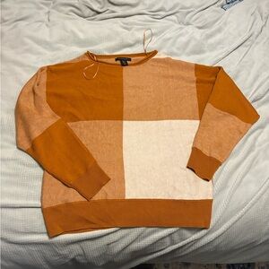 Tahari woman’s Crewneck Sweater in Orange and Cream print